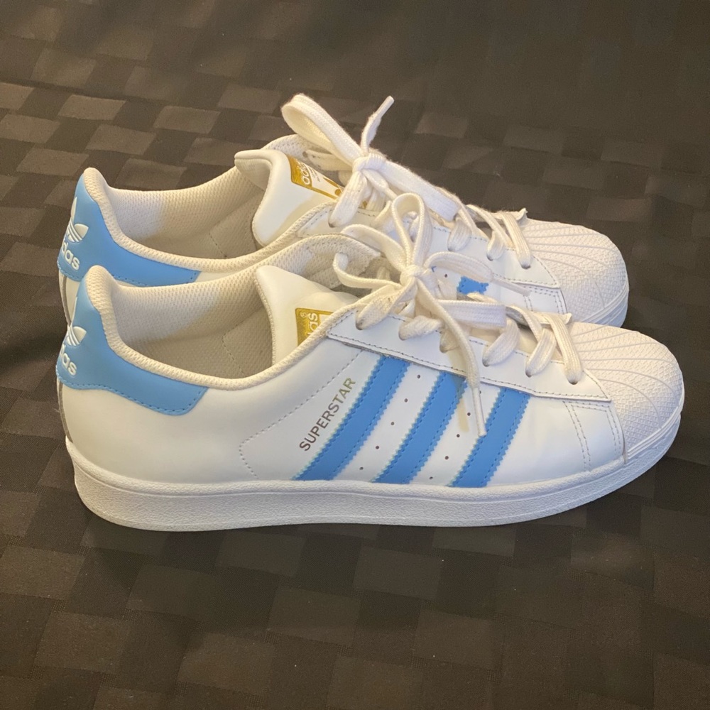 ADIDAS SUPERSTARS, Carolina blue and white, Men’s size 8. Slightly worn. No box.
